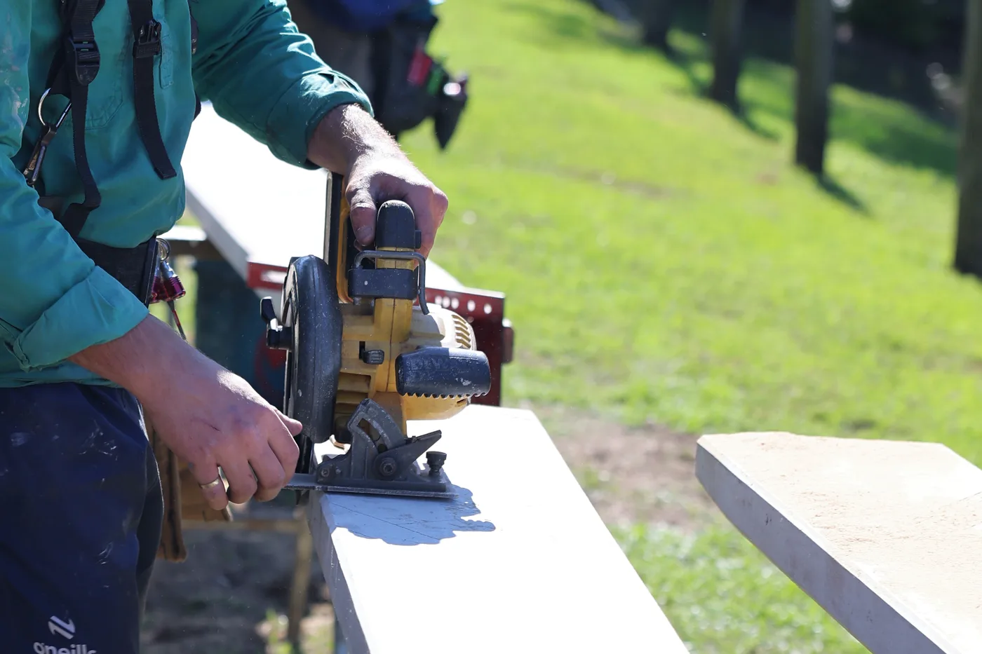 Cutting a board to length with the circular saw on the trestles